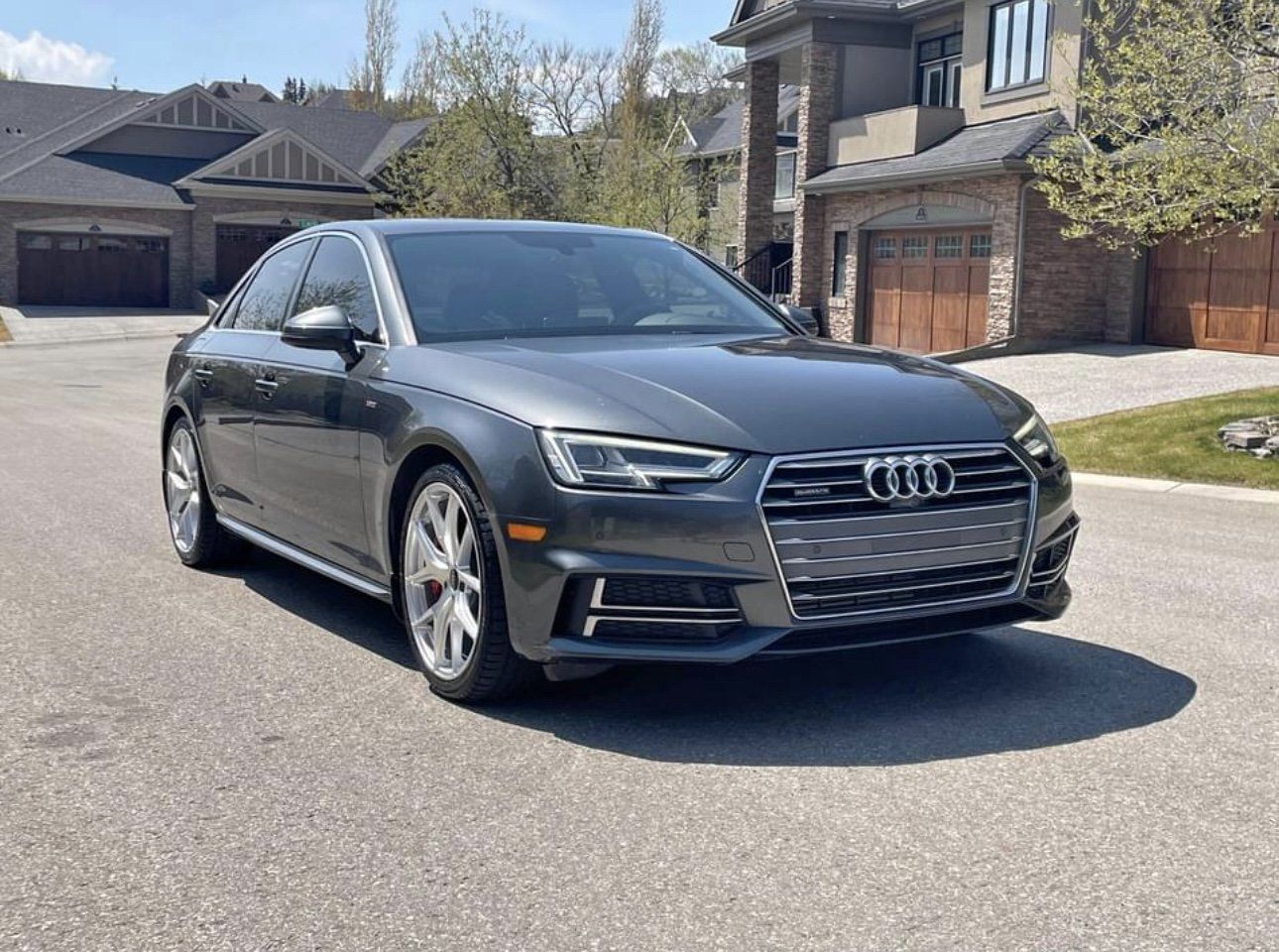 Audi A4 Sedan 2023 in Florett Silver, front three-quarter view
